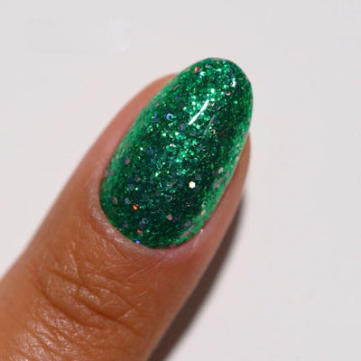 hands wearing 30 Jade Jingle Gel & Polish Diva Duo by DND